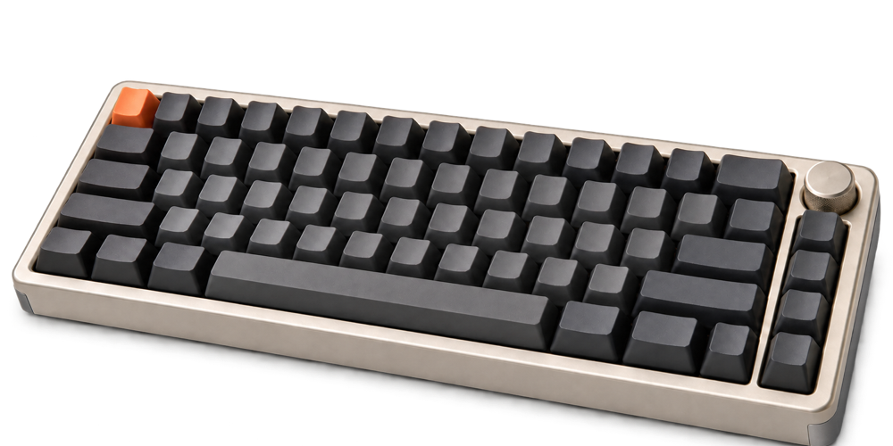 Cream and charcoal mechanical keyboard with an orange escape key